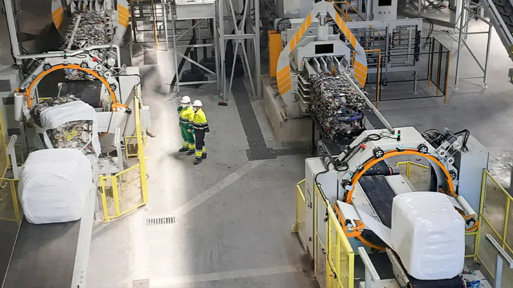 Two CW 2200 wrappers in waste wrapping process